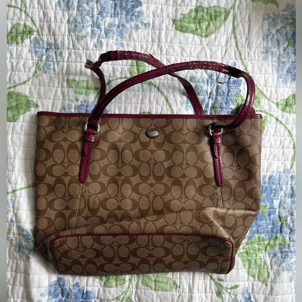 Coach Brown Signature Tote with burgundy straps
